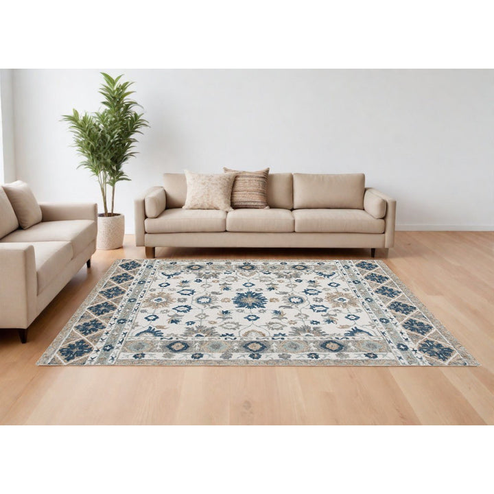 8 x 10 Blue and Ivory Wool Floral Hand Tufted Area Rug Image 1