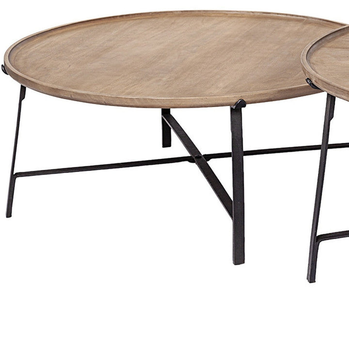 Set of Two 41" Brown And Black Solid Wood And Iron Round Nested Coffee Tables Image 6