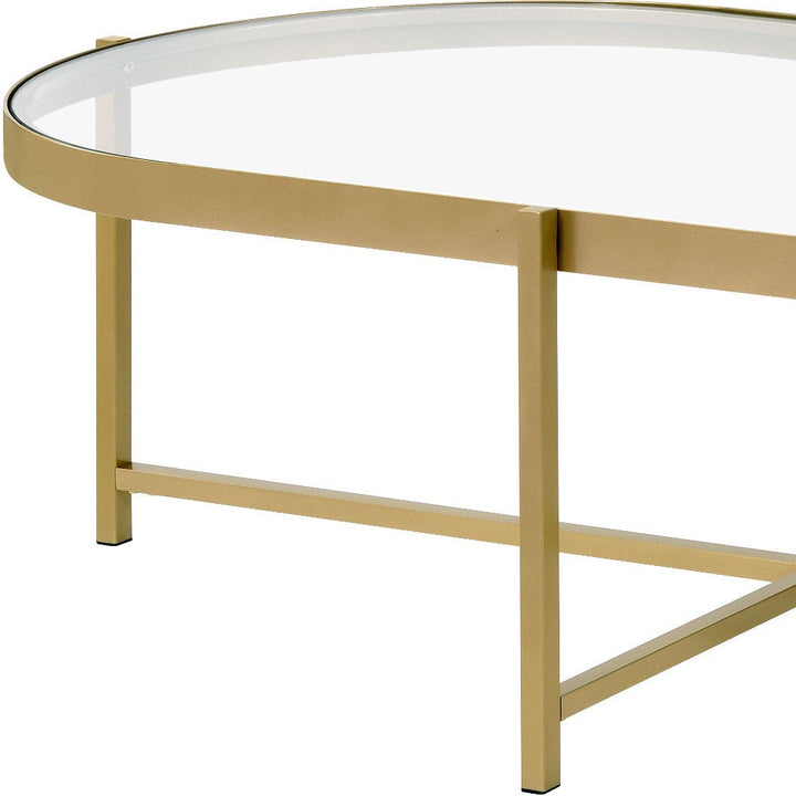 54" Gold And Clear Glass Oval Coffee Table Image 3