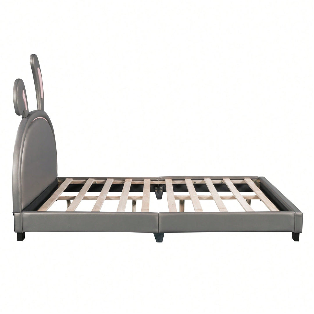 Elegant White Upholstered Leather Platform Bed With Rabbit Accent Image 5