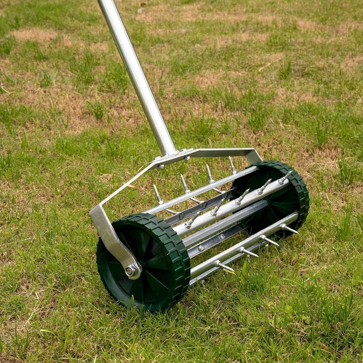 Heavy Duty Rotary Lawn Aerator with Long Steel Handle for Effective Soil Aeration and Grass Care Image 3