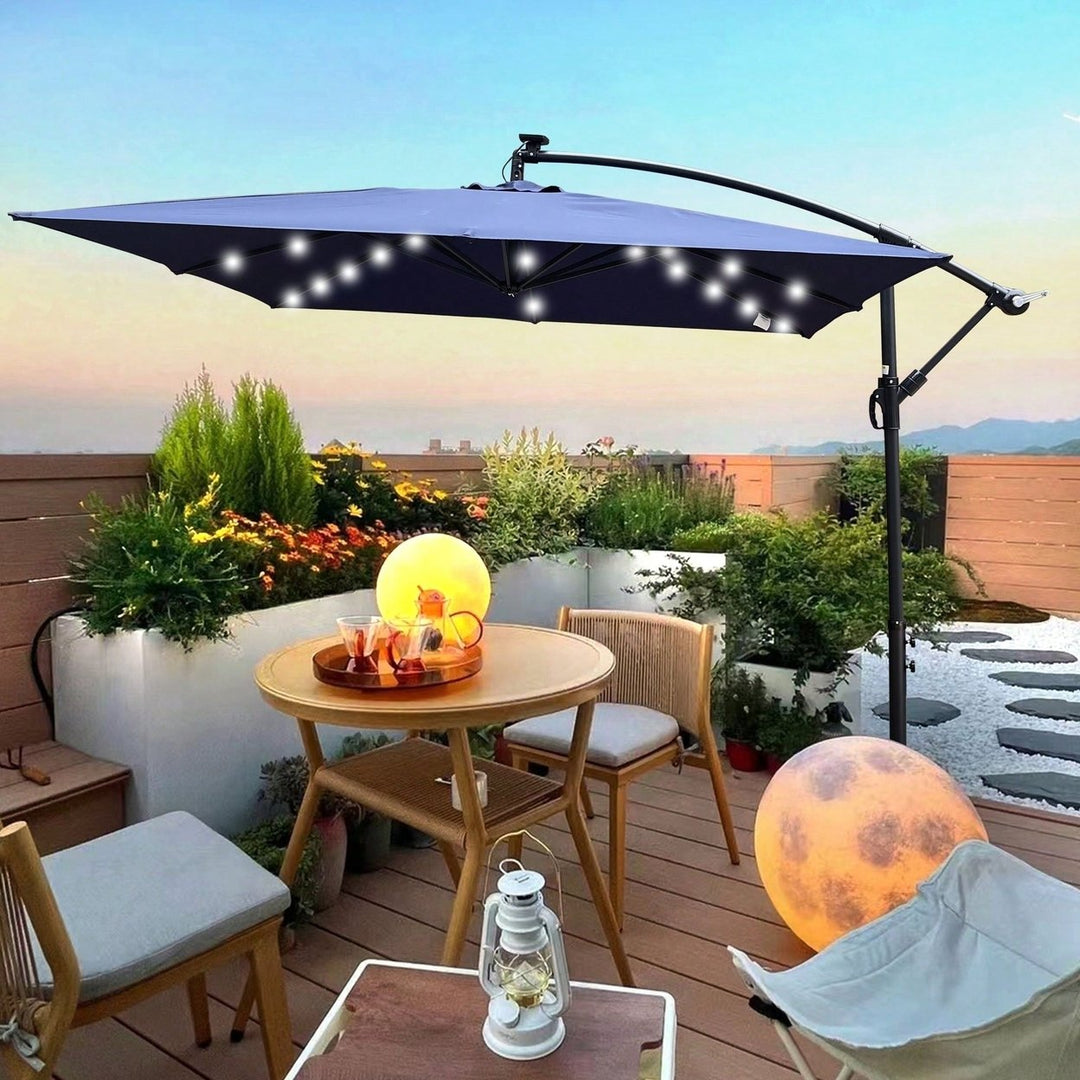 Solar Powered LED Outdoor Patio Umbrella with Crank and Cross Base Waterproof 8 Ribs for Garden Deck Pool Shade Image 7