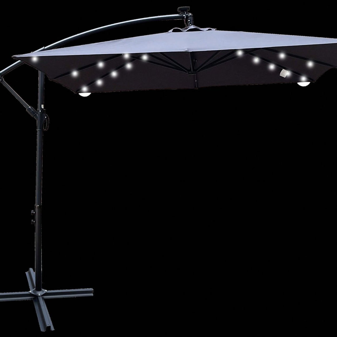 Solar Powered LED Outdoor Patio Umbrella with Crank and Cross Base Waterproof 8 Ribs for Garden Deck Pool Shade Image 8