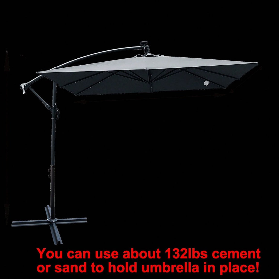 Solar Powered LED Outdoor Patio Umbrella with Crank and Cross Base Waterproof 8 Ribs for Garden Deck Pool Shade Image 10