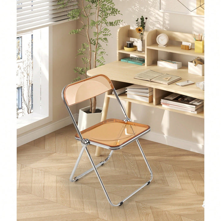 Transparent Stackable Folding Chair With Acrylic Seat And Chrome Frame For Versatile Indoor And Outdoor Use Image 1