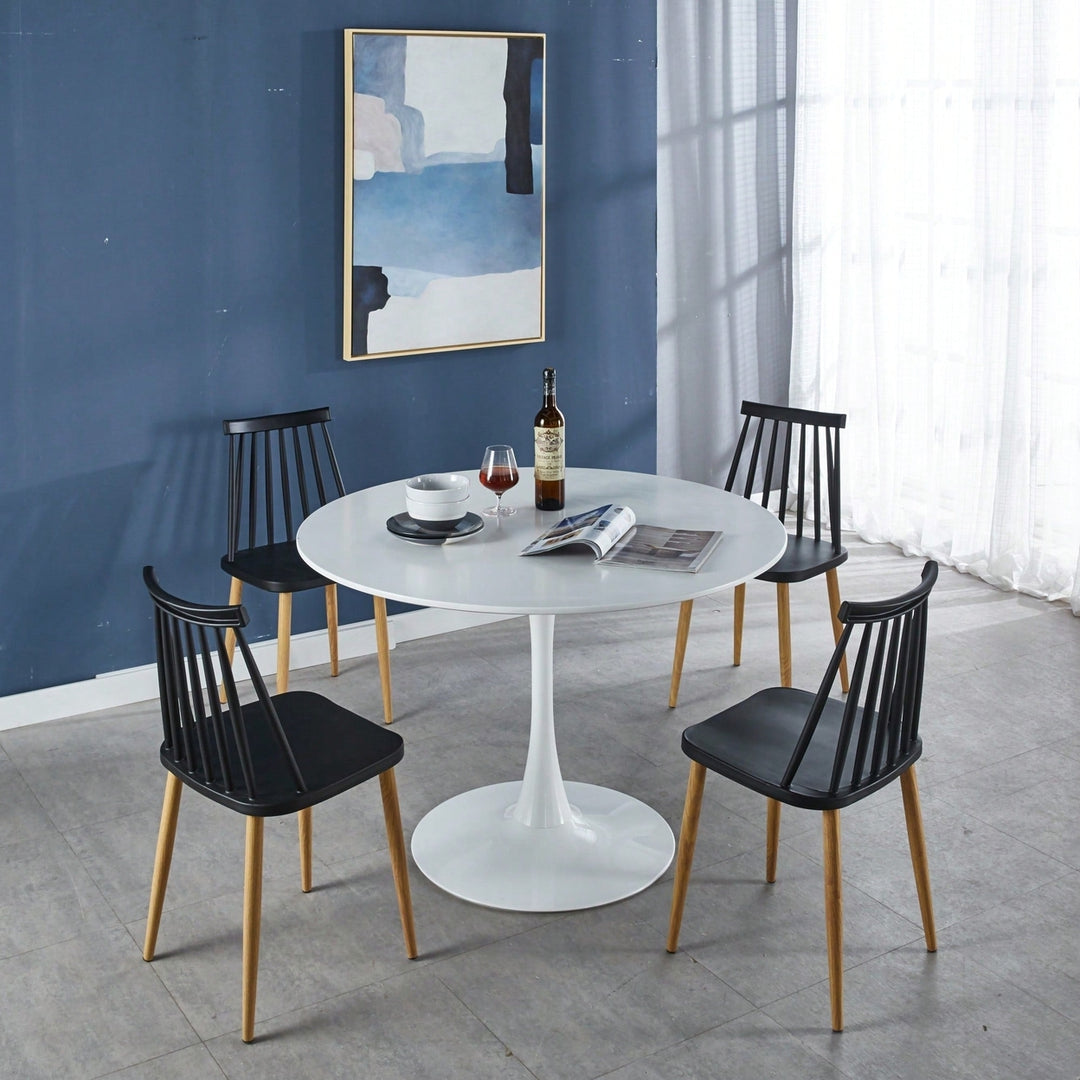 Mid-Century Modern Round Dining Table For 4-6 People With MDF Top And Elegant Pedestal Base Image 9